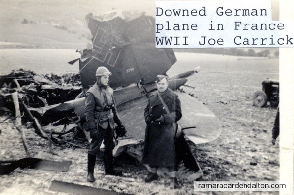 a German plane that crashed near them. Joe Carrick in long coat